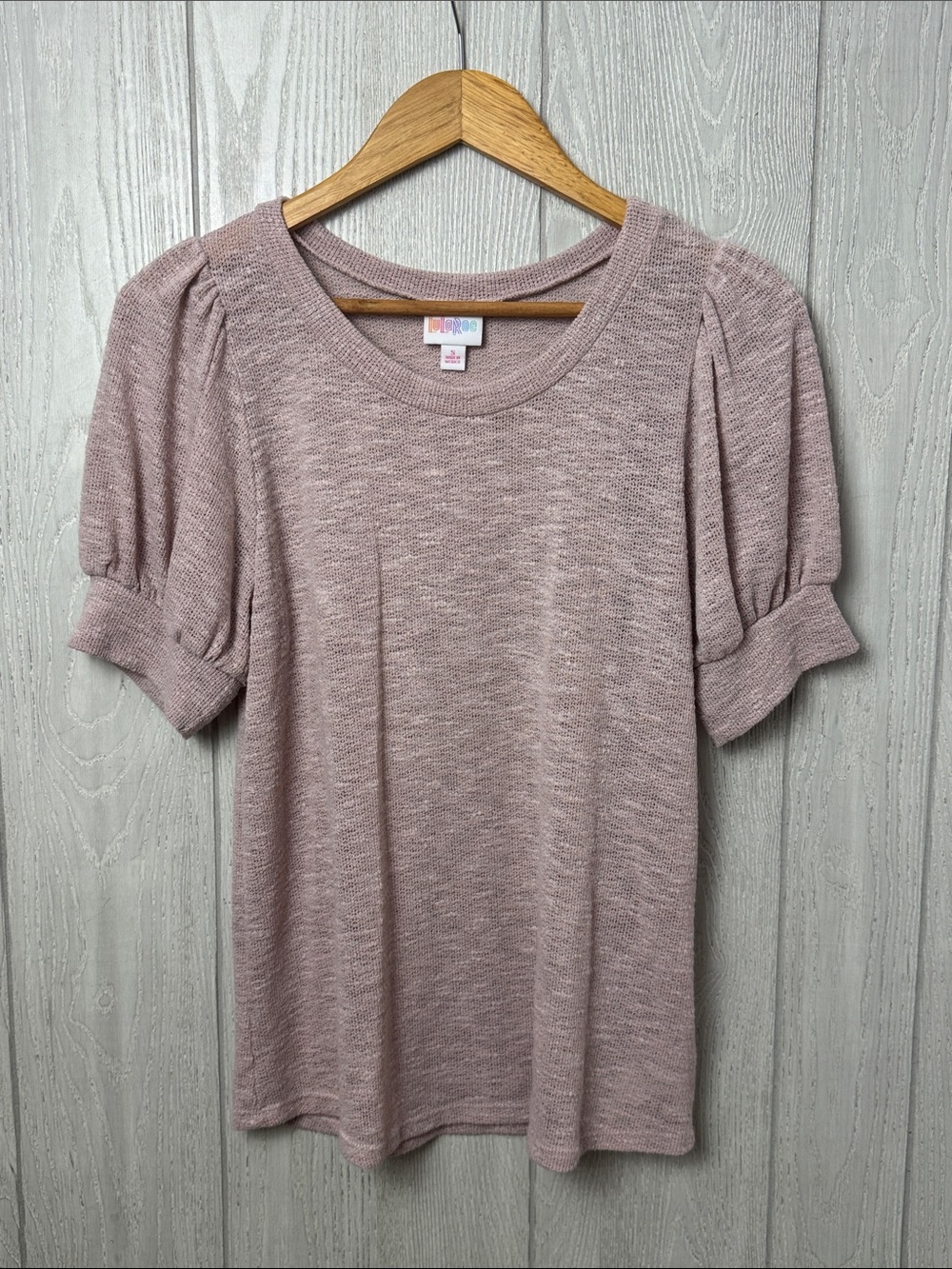 Small knit rose colored blouse with